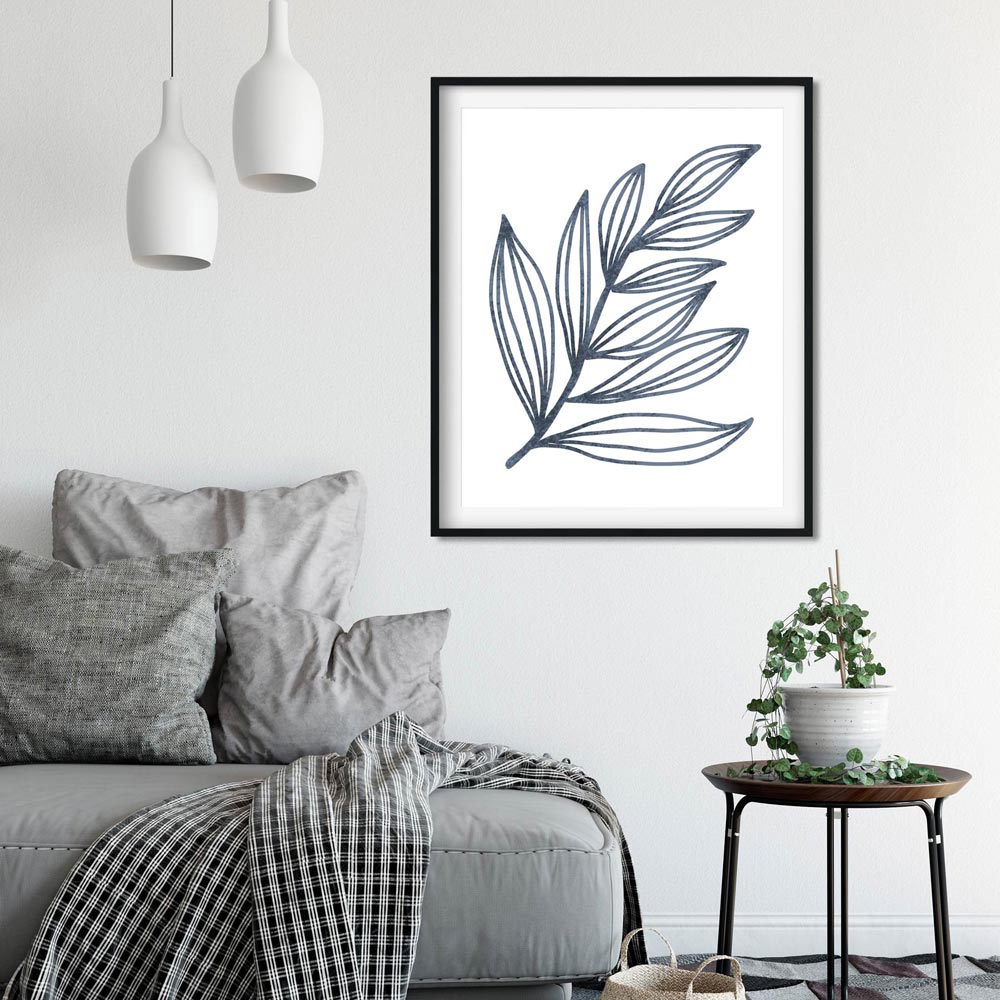 Blue leaf wall art in frame