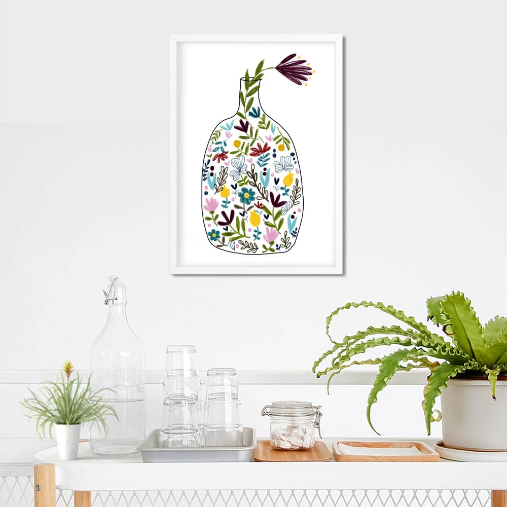 Bottle with flowers art in frame