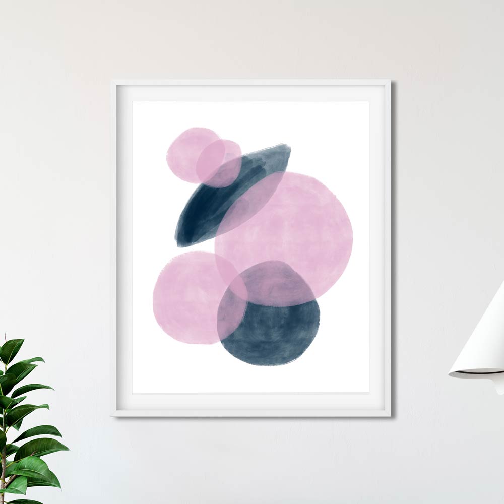 Abstract blue and pink wall art in frame